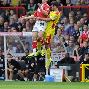 Battling for Supremacy: Bryan vs. Baldock in the Sky Bet League One Clash between Bristol City and MK Dons