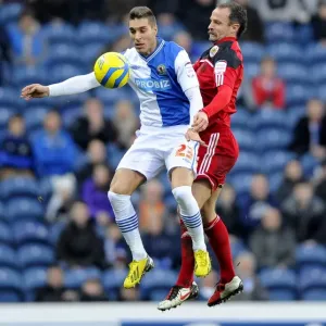 Battling for Supremacy: Carey vs. Rochina in FA Cup Clash between Blackburn and Bristol City