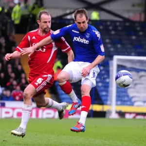 Battling for Supremacy: Carey vs. Varney in Portsmouth vs. Bristol City Football Match, 2012