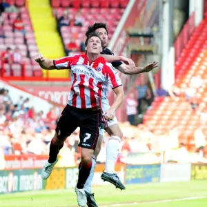 Print of Cole Skuse vs. Darius Henderson in Championship Clash