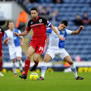 Battling for Supremacy: Cole Skuse vs. Jason Lowe in FA Cup Clash