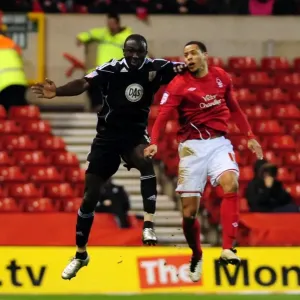 Battling for Supremacy: Damion Stewart vs. David McGoldrick in Forest v Bristol City Football Match, 2011