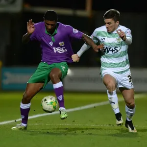 Battling for Supremacy: Derrick Williams vs. Adam Morgan in Yeovil Town vs. Bristol City Football Match, 2015