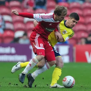 Battling for Supremacy: Edwards vs. Martin at Riverside Stadium - Middlesbrough vs. Bristol City Football Match, 2012 Battling for Supremacy: Edwards vs. Martin at Riverside Stadium - Middlesbrough vs. Bristol City Football Match, 2012