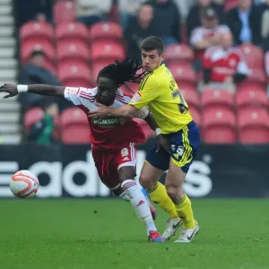 Battling for Supremacy: Edwards vs. Emnes in Middlesbrough vs. Bristol City Football Match, 2012 Battling for Supremacy: Edwards vs. Emnes in Middlesbrough vs. Bristol City Football Match, 2012