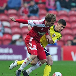 Battling for Supremacy: Edwards vs. Martin at Riverside Stadium - Middlesbrough vs. Bristol City Football Match, 2012