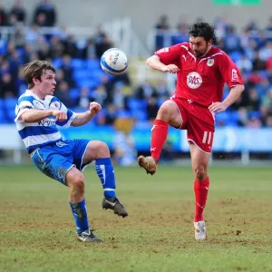 Battling for Supremacy: Hartley vs. Tabb in the Championship Clash between Reading and Bristol City (13/03/2010) Battling for Supremacy: Hartley vs. Tabb in the Championship Clash between Reading and Bristol City (13/03/2010)