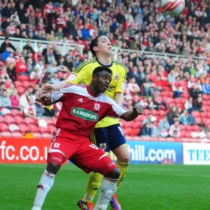 Battling for Supremacy: Hogan Ephraim vs. Barthomew Ogbeche in Middlesbrough vs. Bristol City Football Match, 2012 Battling for Supremacy: Hogan Ephraim vs. Barthomew Ogbeche in Middlesbrough vs. Bristol City Football Match, 2012