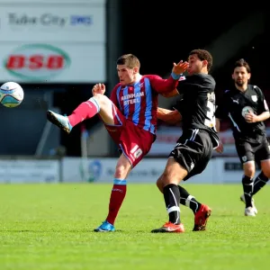 Battling for Supremacy: Hooper vs. Nyatanga in the Championship Clash between Scunthorpe and Bristol City (17/04/2010) Battling for Supremacy: Hooper vs. Nyatanga in the Championship Clash between Scunthorpe and Bristol City (17/04/2010)