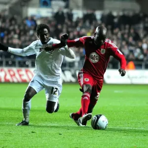 Battling for Supremacy: Jamal Campbell-Ryce vs. Nathan Dyer in Swansea City vs. Bristol City Championship Clash (10/11/2010)