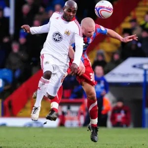 Battling for Supremacy: Jamal Campbell-Ryce vs. Alex Marrow in Championship Clash between Crystal Palace and Bristol City