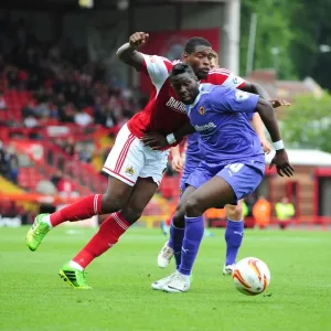 Battling for Supremacy: Jay Emmanuel-Thomas vs. Bakary Sako in Bristol City vs. Wolves Football Match