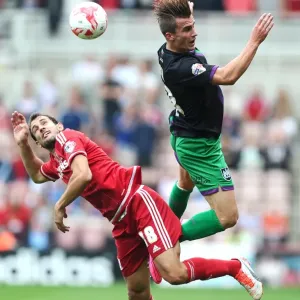 Battling for Supremacy: Joe Bryan vs. Christian Stuani in Middlesbrough vs. Bristol City Championship Clash