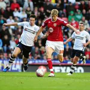 Battling for Supremacy: Jon Stead vs. Sean St. Ledger in the Championship Clash between Bristol City and Preston North End Battling for Supremacy: Jon Stead vs. Sean St. Ledger in the Championship Clash between Bristol City and Preston North End