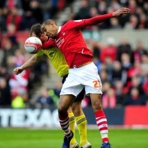Battling for Supremacy: Louis Carey vs. Dexter Blackstock in Nottingham Forest vs. Bristol City Football Match, 07-04-2012 Battling for Supremacy: Louis Carey vs. Dexter Blackstock in Nottingham Forest vs. Bristol City Football Match, 07-04-2012