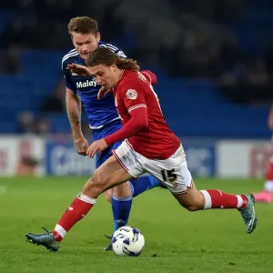 Battling for Supremacy: Luke Freeman vs. Aron Gunnarsson in Cardiff City vs. Bristol City Championship Clash
