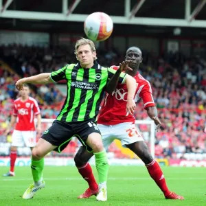 Battling for Supremacy: Mackail-Smith vs. Adomah in the Championship Clash between Brighton and Bristol City (September 10, 2011)