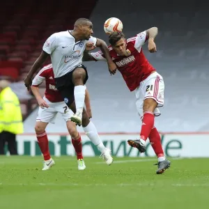 Battling for Supremacy: Marlon Pack vs. Tyrone Barnett in the Sky Bet League One Clash between Bristol City and Peterborough United