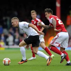 Battling for Supremacy: Marlon Pack vs Jack Payne in Bristol City vs Peterborough United Clash