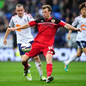 Battling for Supremacy: Martyn Woolford vs. Jay Spearing in the 2012 Championship Clash between Bolton Wanderers and Bristol City Battling for Supremacy: Martyn Woolford vs. Jay Spearing in the 2012 Championship Clash between Bolton Wanderers and Bristol City