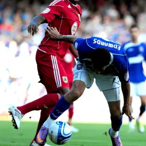 Print of Marvin Elliott in action against Carlos Edwards