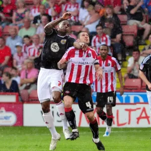 Bristol City FC Print: Marvin Elliott vs. Nick Montgomery, 23/04/2011