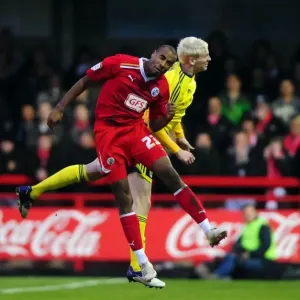 Battling for Supremacy: McGivern vs. Barnett in FA Cup Clash Between Crawley Town and Bristol City, 07/01/2012