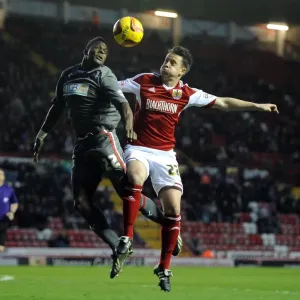 Battling for Supremacy: Nicky Shorey vs. Kieran Agard in the Height of the Air Battle at Ashton Gate