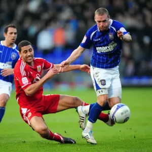 Battling for Supremacy: Nyatanga vs. Leadbitter in Ipswich Town vs. Bristol City Football Match, 2012