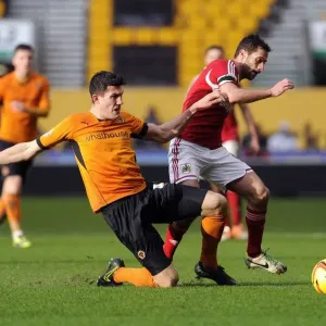 Battling for Supremacy: Wolves Danny Batth vs. Bristol City's Sam Baldock in Sky Bet League One Clash