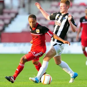Bobby Reid in Action: A Thrilling Pre-Season Encounter at Dunfermline Athletic's East End Park Bobby Reid in Action: A Thrilling Pre-Season Encounter at Dunfermline Athletic's East End Park