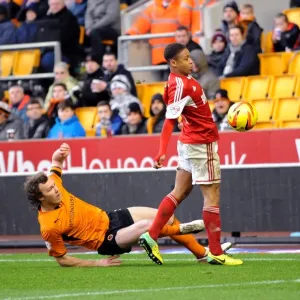 Bobby Reid Dodges a Challenge from Kevin McDonald during Wolves vs. Bristol City (January 25, 2014)