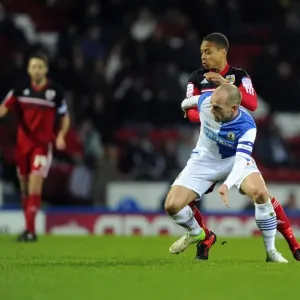 Bobby Reid Steals the Ball from Danny Murphy: A Pivotal Moment in Blackburn Rovers vs. Bristol City FA Cup Match, January 2013