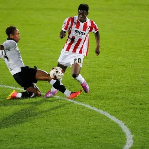Bobby Reid Tackles Koby Arthur in Pre-Season Clash between Cheltenham Town and Bristol City Bobby Reid Tackles Koby Arthur in Pre-Season Clash between Cheltenham Town and Bristol City