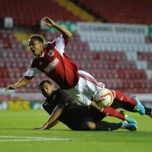 Bobby Reid vs Adrian Mariappa: Intense Penalty Box Clash in Bristol City vs Reading Football Match