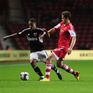 Bobby Reid vs. Gastón Ramirez: Intense Clash in Southampton vs. Bristol City Football Match, September 2013
