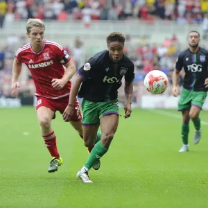 Bobby Reid vs Grant Leadbitter: Intense Battle for Ball Possession in Middlesbrough vs Bristol City Championship Clash