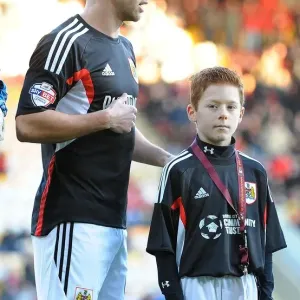 Bradford City vs. Bristol City: Sam Baldock and the Bristol City Mascot at Coral Windows Stadium (January 11, 2014) Bradford City vs. Bristol City: Sam Baldock and the Bristol City Mascot at Coral Windows Stadium (January 11, 2014)