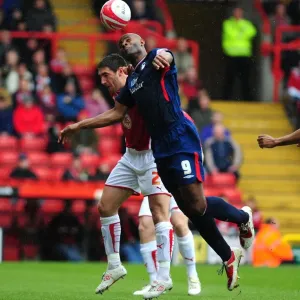 Print of Bradley Orr vs. Dele Adebola aerial challenge in Championship match