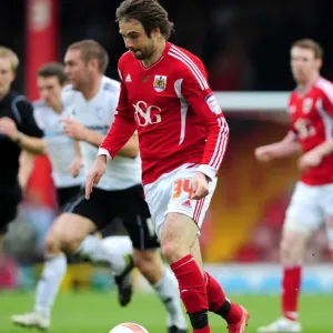 Brett Pitman of Bristol City Faces Off Against Derby County at Ashton Gate Stadium, 2012