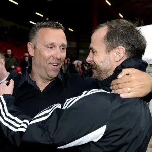 A print of Brian Tinnion meeting Louis Carey at Ashton Gate
