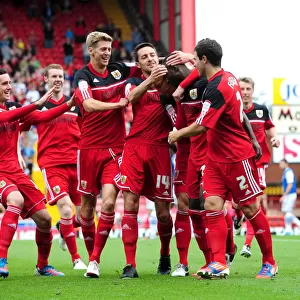 Bristol City Celebrates Championship Win: Albert Adomah and Team Mates Rejoice After Goal Against Blackburn Rovers