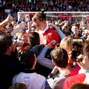 Bristol City Celebrates League One Title: Aden Flint Amidst Ecstatic Fans Bristol City Celebrates League One Title: Aden Flint Amidst Ecstatic Fans