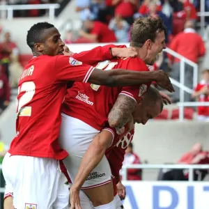 Bristol City Celebrates Win Against Brentford: Aaron Wilbraham Leads the Charge