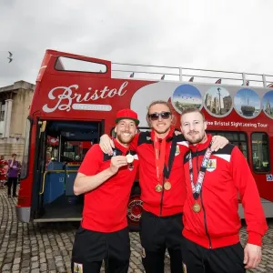 Bristol City Champions: Greg Cunningham, Luke Ayling, and Wade Elliott Celebrate Promotion to Championship on Open Top Bus Parade Bristol City Champions: Greg Cunningham, Luke Ayling, and Wade Elliott Celebrate Promotion to Championship on Open Top Bus Parade