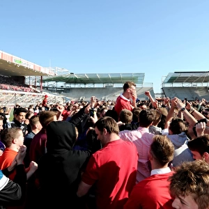 Bristol City Crowned Champions: Euphoric Fans Invade Pitch