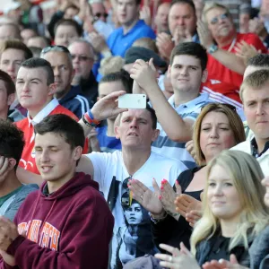Bristol City Fan Cheers at Ashton Gate during Bristol City vs Colchester United, Sky Bet League One (16/08/2014) Bristol City Fan Cheers at Ashton Gate during Bristol City vs Colchester United, Sky Bet League One (16/08/2014)