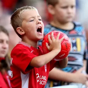 Bristol City Fan's Passion: Cheering on the Team at Ashton Gate Stadium