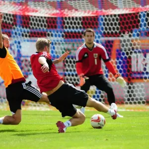 Bristol City Football Club: Jon Stead and Louis Carey in Intense Training Battle