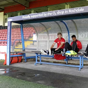 Bristol City Footballers Wes Burns, Bobby Reid, and Karleigh Osborne on the Bench at Rochdale's Spotland Stadium during Sky Bet League One Match